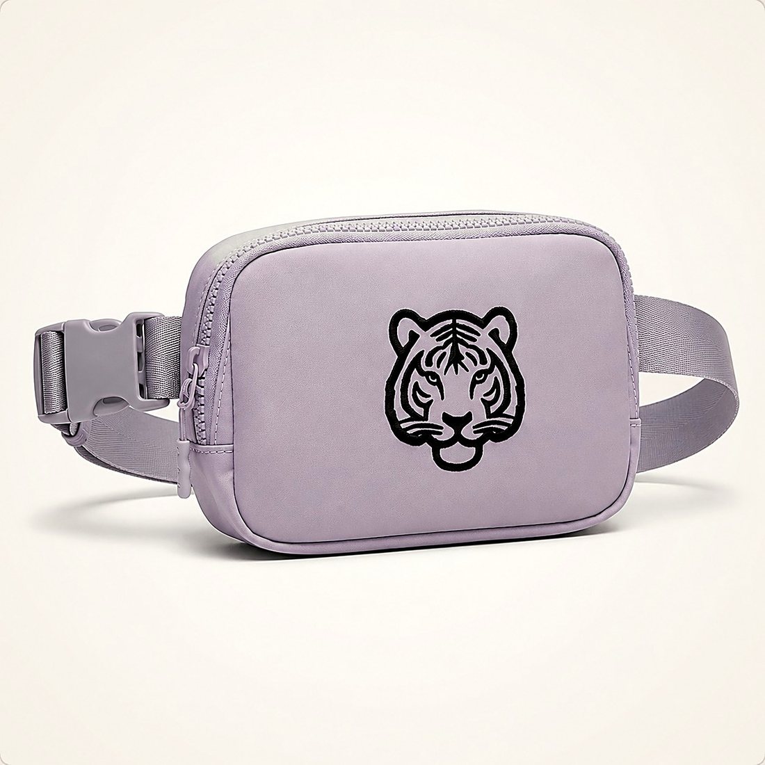 The Belt Bag in Grey — pale grey belt bag with a black velvet tiger print