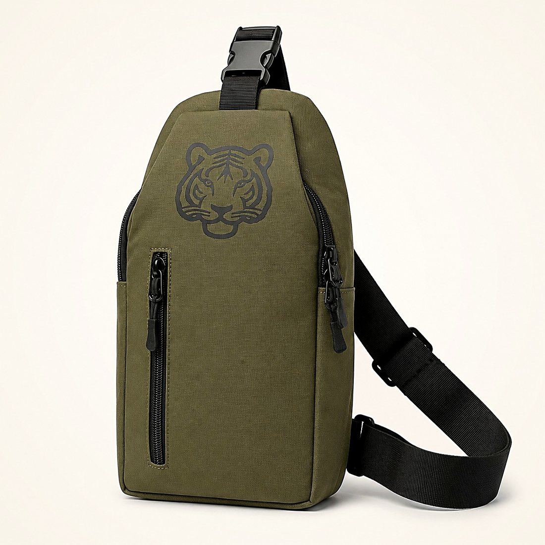 The Cross Body in Olive — olive canvas sling bag with a tiger print and front zip pockets