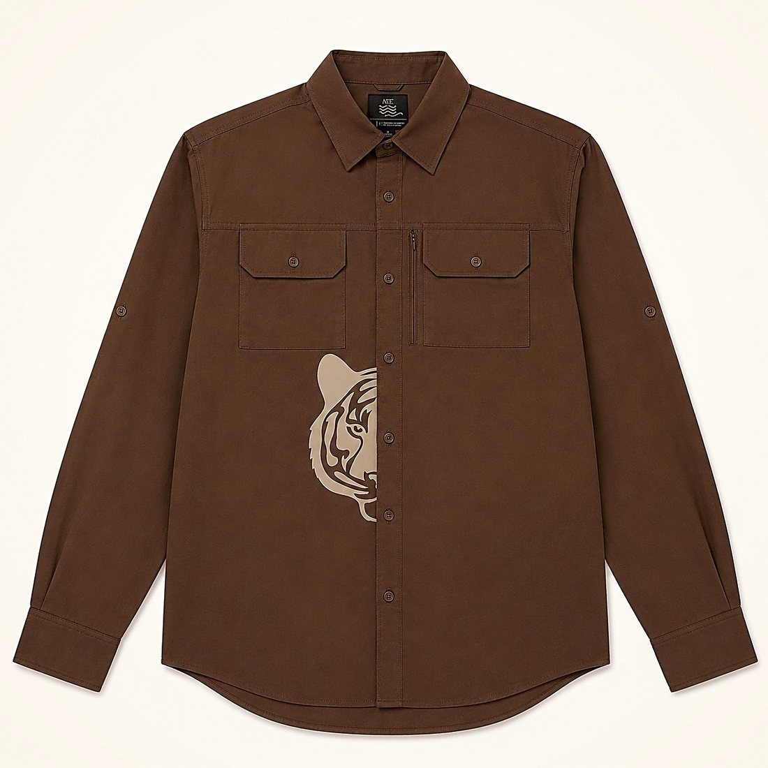 The Expedition Shirt in Ridge — deep brown cotton safari shirt with an off-white half tiger print at the placket