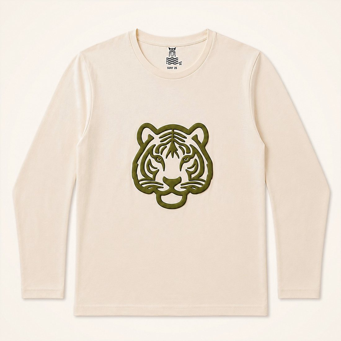 The Little Tiger Tee in Cream — cream long-sleeve tee with an olive puff-print tiger face